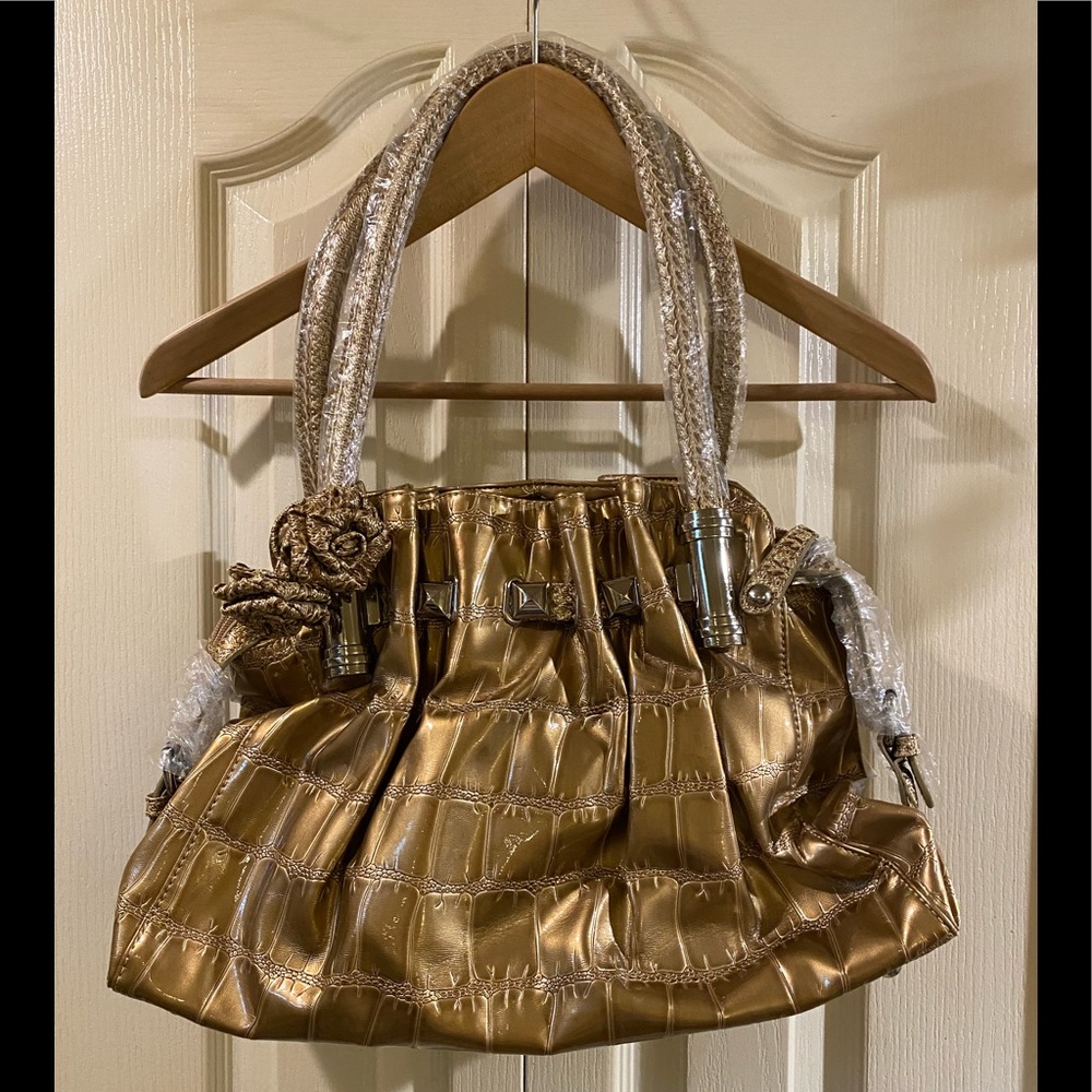 Metallic Gold Patent shoulder bag w/ rosette accent